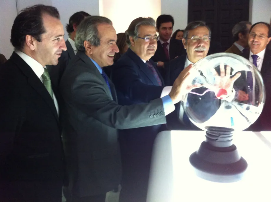 Officials at one of the lab tables on the opening day of the exhibit.