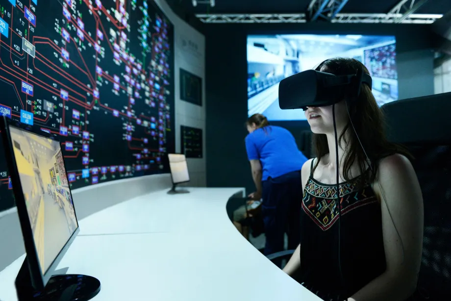A visitor taking the virtual tour of the Cecoel (Electrical Control Centre).