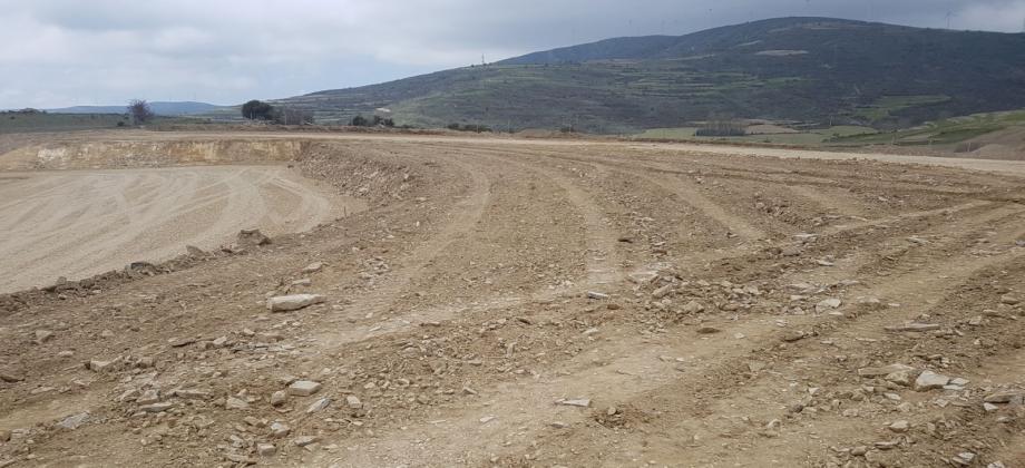 Land restored to its original elevation, covering the full extent of the excavated strip