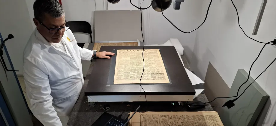 Museum technician digitizes paper newspaper archive